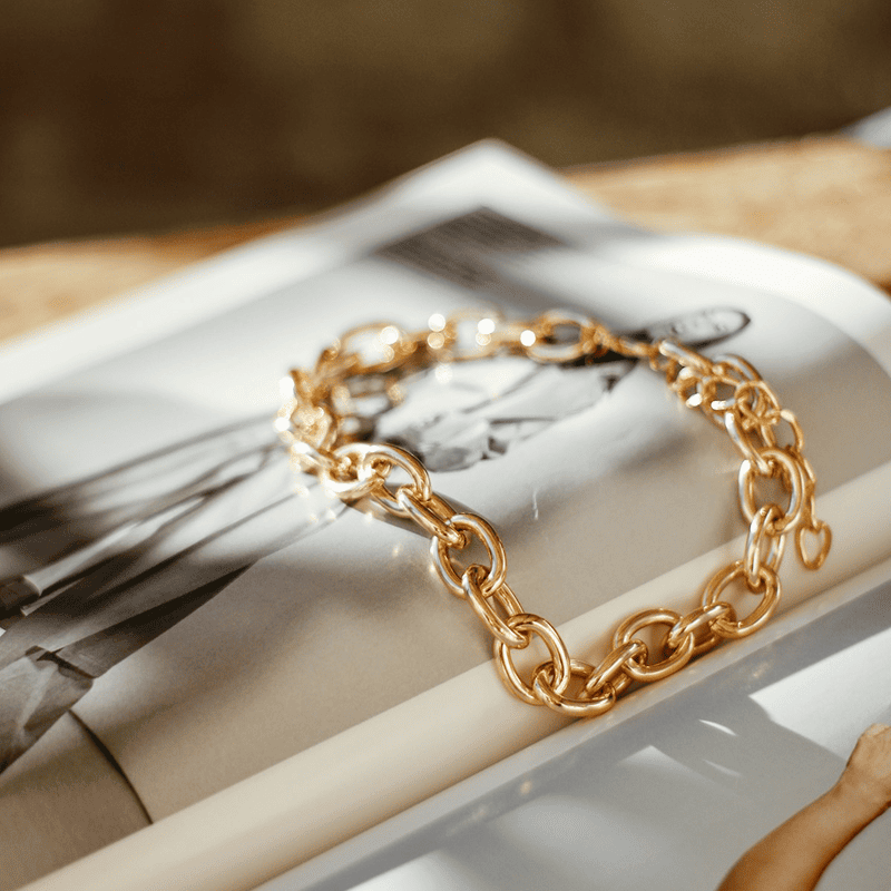 Gold Charm Bracelet with Heart Pendants